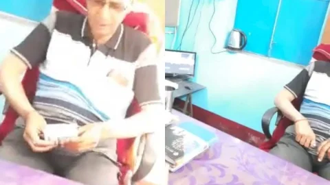 धनबाद: कोल तस्कर से पांच हजार रुपये लेते अलकडीहा ओपी प्रभारी का Video Viral, जांच शुरु