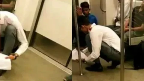 नई दिल्ली: मेट्रो में टिफिन गिरा तो रुमाल से साफ करने लगा फर्श, वीडियो वायरल 